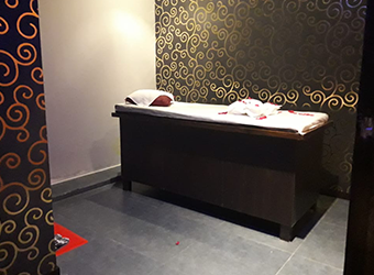 spa room interior with beautiful bed rainbow massage center Karachi